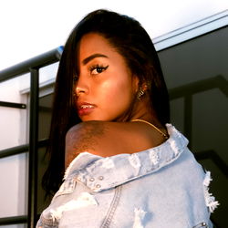 Model Lexi Posing with Denim Jacket