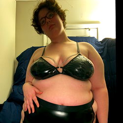 Model in a Black Latex Bustier