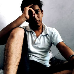 Young Man in White and Blue Shirt