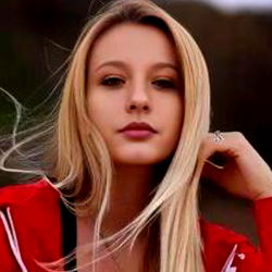 Blonde Haired Model in Red and Black Jacket