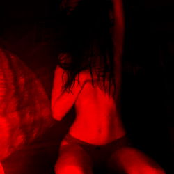 Red Scene with a Model in the Background