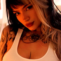 Andressa Sisto - Striking Tattoos and Athletic Style