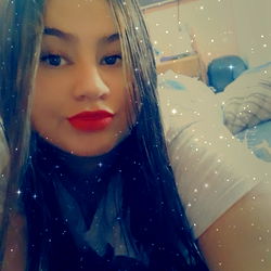 A Stylish Young Lady Posing for a Selfie