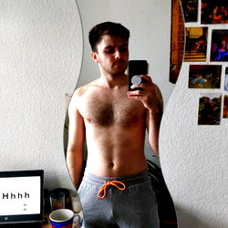 Fitness Model Showcasing His Shirtless Physique