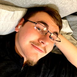 Young Man with Glasses and Goatee