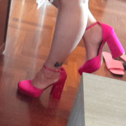 Stylish High-Heeled Pink Shoe Display