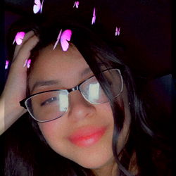 Girl in Glasses with Bunches of Butterflies