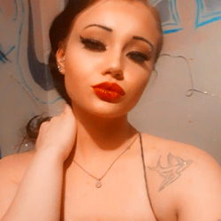 Ariel Helene, OnlyFans Model in Red Gown with Tattoos