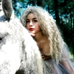 Malia, OnlyFans Model, in a Fantasy Setting with Donkey