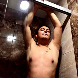 Shirtless Man in Shower