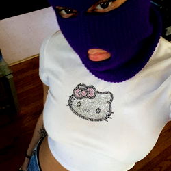 Fashionable Model in Baby Doll Mask and Hell Kitty Shirt
