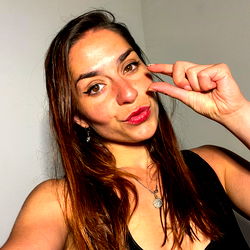 Selfie of a Model with a Hand Signal