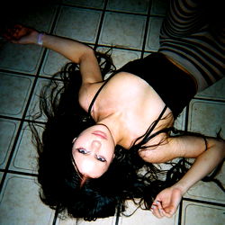 Model pose on tiled floor
