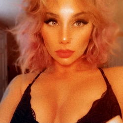 A captivating OnlyFans model, Littlered Ren from Rhode Island