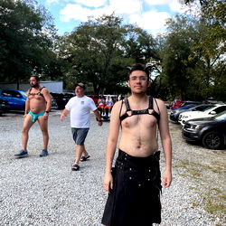 An OnlyFans Model in a Scottish Outfit on a Gravel Lot