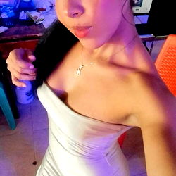 Model Andrea Julio in a White Outfit