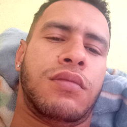 Bearded Man with Necklace and Short Hair in Casual T-shirt