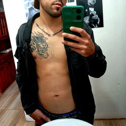 Fit Model Juan, Showcasing a Tattoo and Muscle Definition