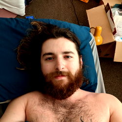 Bearded Man with Tattoo on His Forearm