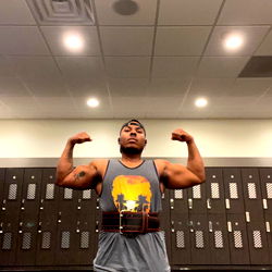 Muscular Man in Gym Shirt