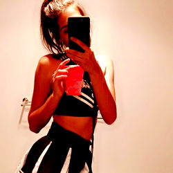 Model in Cosplay Posing for Selfie