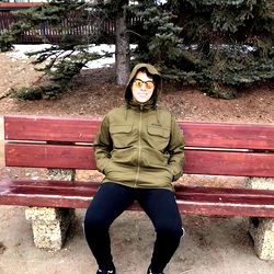 Person sitting on a park bench