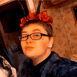 A West Virginia-based onlyfans model showcasing a unique red rose hair accessory,