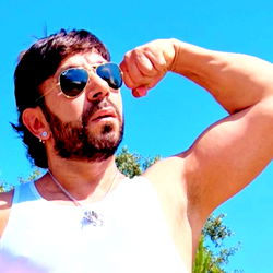 Reyx, a fitness enthusiast in a tank top.