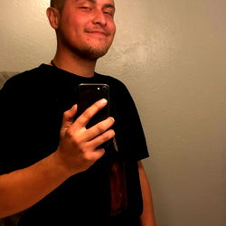 Francisco's Pensive Pose in the Bathroom