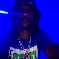 A.Butta in a Blue-Toned Club Atmosphere