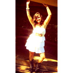 Candid Moment of OnlyFans Model Ash, Striking a Pose in a Rustic Setting