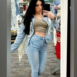 Fashionable Model in High Street Outfit at Mall