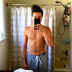 Fit Model Mike Amiri in Bathroom Mirror