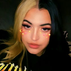 Stylish and youthful model in fashionable outfit,