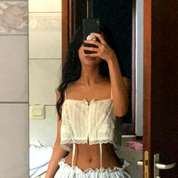 OnlyFans Model ValeriaReal in Ruffled White Crop Top and Cut-Off Denim Shorts