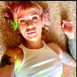 Onlyfans Model Alli Taking a Selfie on the Floor