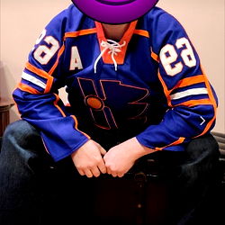 Fan in Edmonton Oiler's Jersey with Devil Emoji