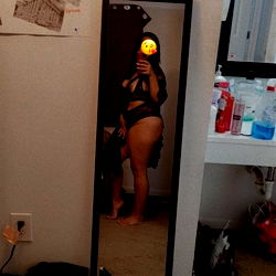 A Model Posing in a Bathroom