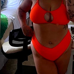 Stylish Arianna in Orange Swimsuit