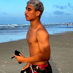 Ivel, a Brazilian model with striking hair and intense gaze.