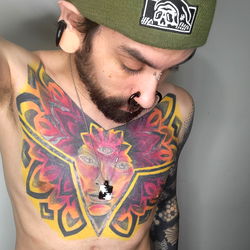 Colorful Tattoo Art with Sun Motif