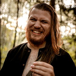 A VIP Model with Hiking Gear in the Forest