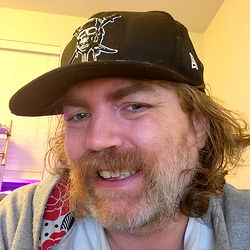 Man in Portland, Oregon with Beard and Ball Cap