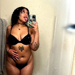 OnlyFans Model Cherry Poses in Bathroom Mirror for Photoshoot