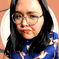 Woman with glasses making a face