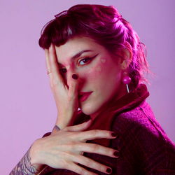 Fashionable Model in Colorful Striped Dress