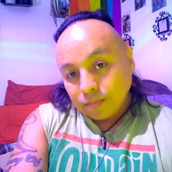 Bearded Man with Mohawk and Tattoos