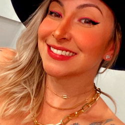 Smiling Brazilian Model in Choker and Tattoos