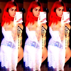 Model Thickumz88 in Philly, Showcasing Her Stylish Outfit and Exotic Tattoos