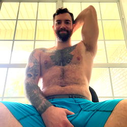 Adult Model Daddyrifflord$ in Blue and Yellow Swim Trunks